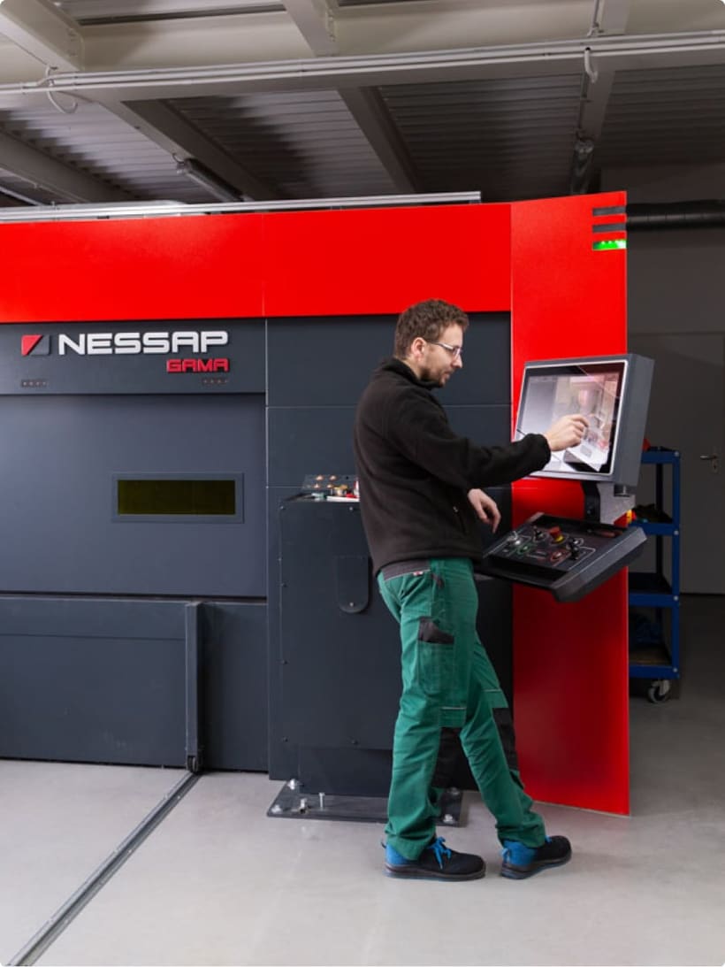 Bristell technician operating the fiber laser cutting machine
