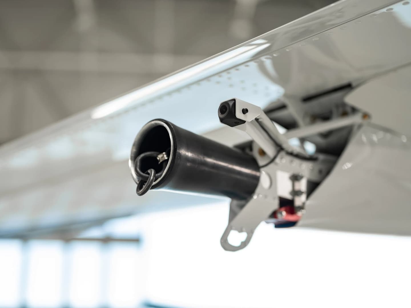 Rear-view camera mounted next to the tow winch on a Bristell aircraft