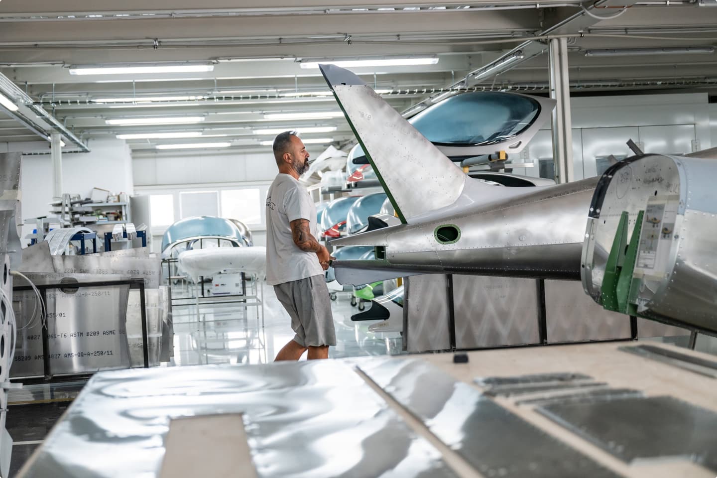 The Bristell production floor in Kunovice, with aircraft airframes in assembly